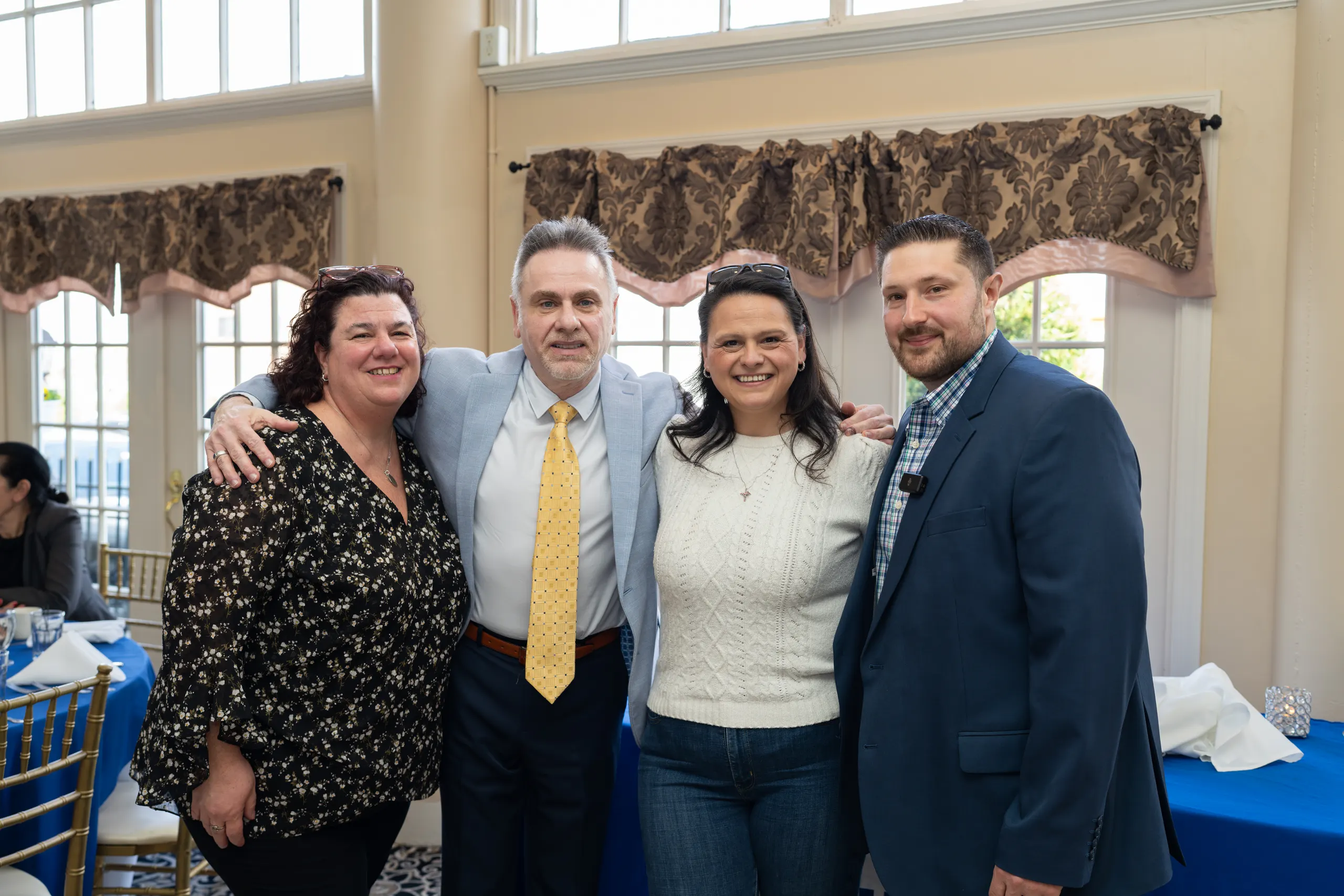 Four M. Donato & Company agents together at a company event