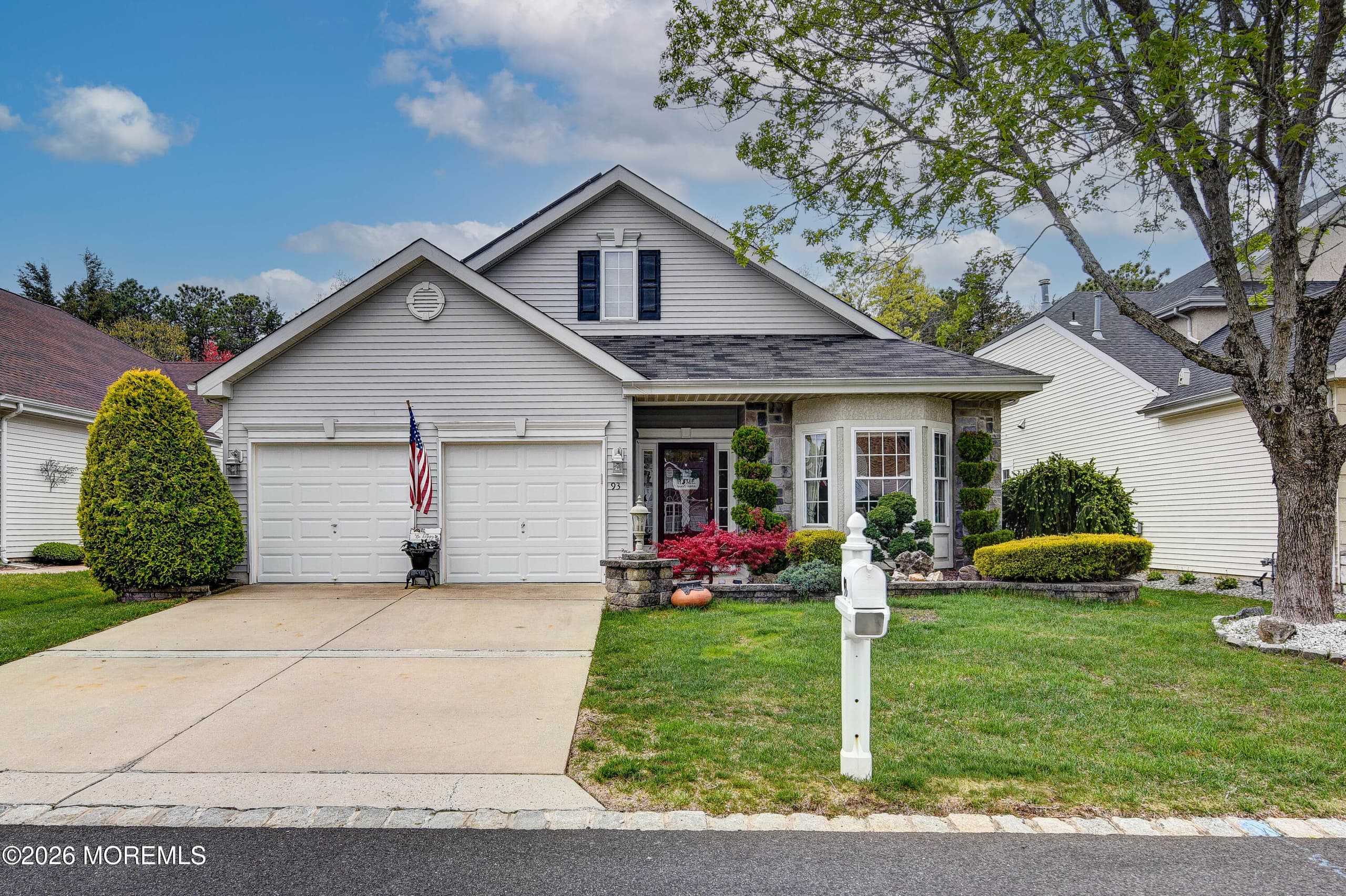 Welcome to 93 Pebble Beach Blvd in a premier 55+ gated community built by Toll Brothers and home to the highly sought-after 18-hole Arthur Hills Championship Golf Course. This beautiful stone front home is set on a premium, professionally landscaped, private lot backing to woods, offering peace and privacy.