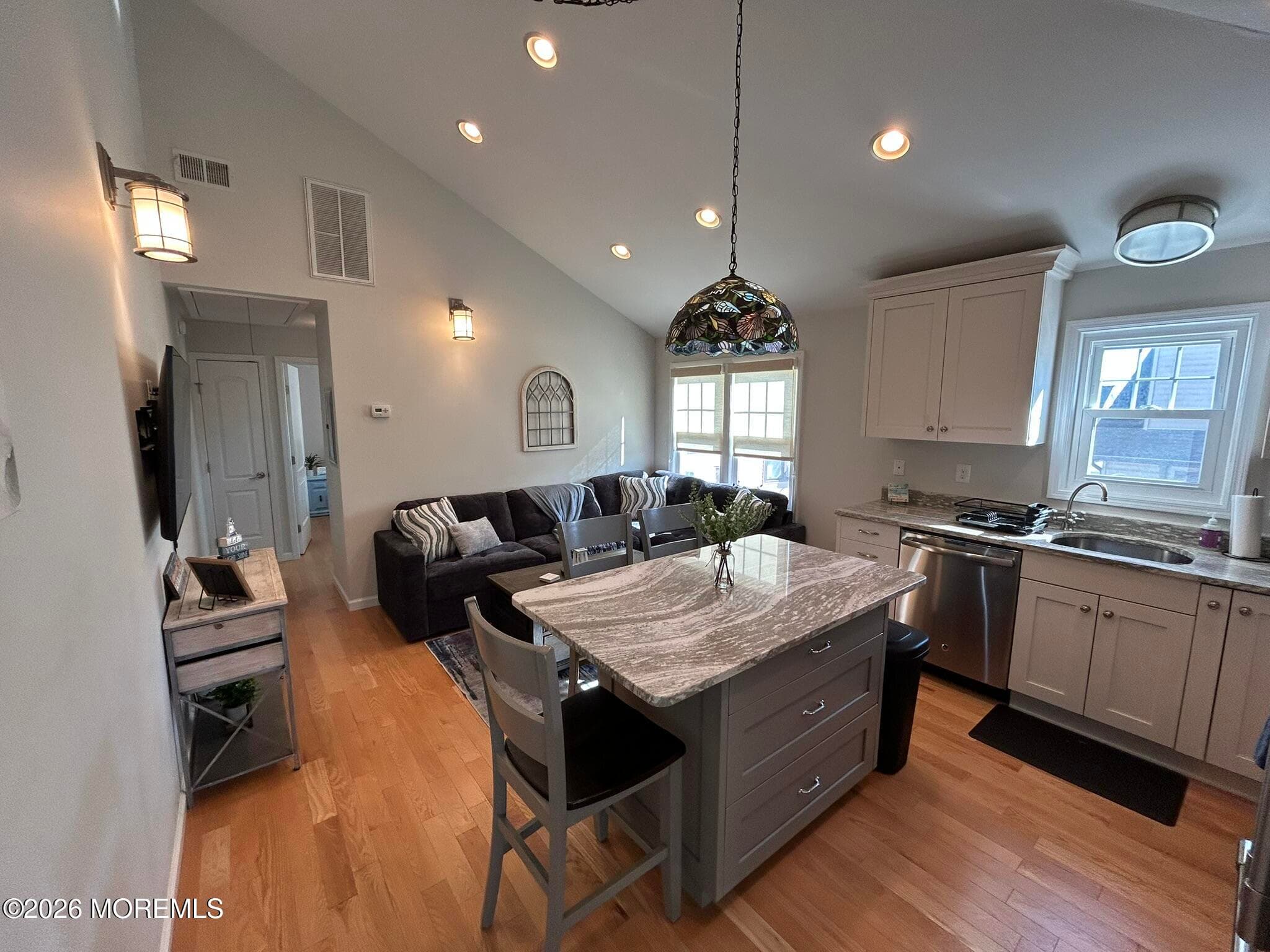 Open Concept Kitchen & Living Room with Vaulted Ceilings